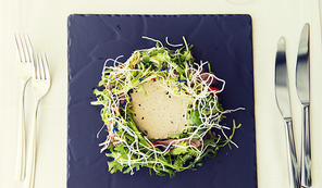 food, culinary, haute cuisine and cooking concept - close up of poultry salad with 밥 noodles and caesar sauce at restaurant