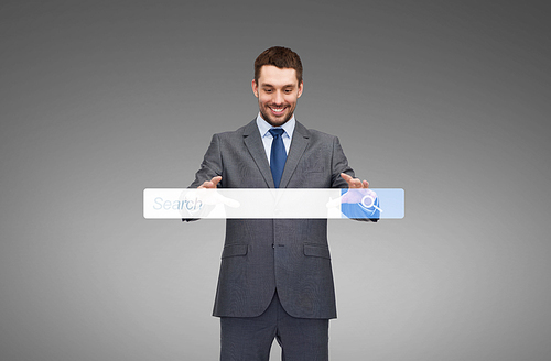 business, technology and people concept - smiling businessman working with internet search bar