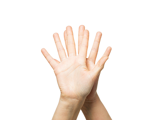 gesture, people and body parts concept - close up of two hands showing five fingers