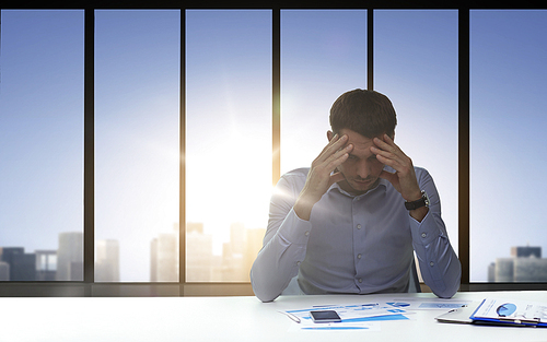 business, deadline, fail, people and stress concept - close up of anxious businessman with papers and smartphone