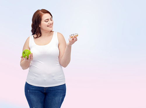 healthy eating, junk food, diet and choice people concept - smiling plus size woman choosing between apple and donut over rose quartz and serenity gradient background