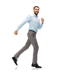 happiness, freedom, movement and people concept - smiling young man running away