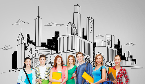 education, school and people concept - group of smiling teenage students with folders and school bags over city drawing background