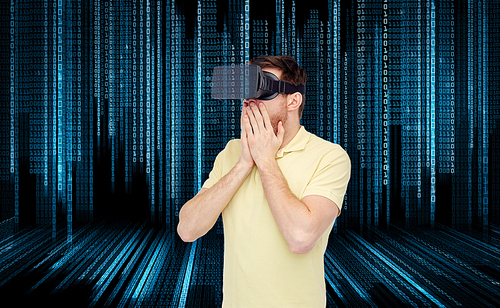 3d technology, virtual reality, entertainment and people concept - amazed young man with virtual reality headset or 3d glasses playing game over binary code background