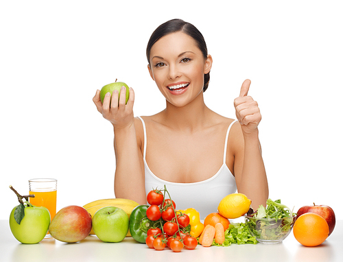 beautiful woman with healthy food showing thumbs up