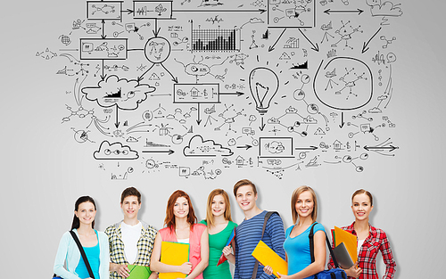 education, school and people concept - group of smiling teenage students with folders and school bags over background with scheme drawing