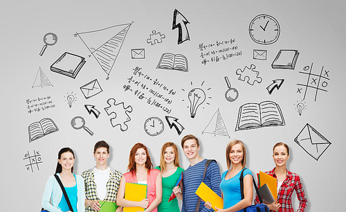 education, school and people concept - group of smiling teenage students with folders and school bags over gray background with doodles