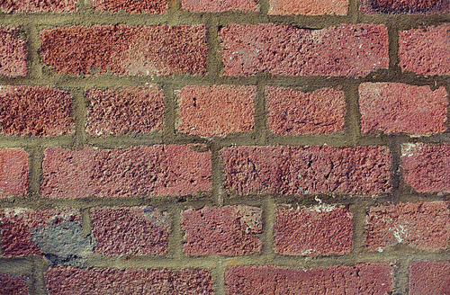 brickwork, backgrounds and textures concept - red brick wall