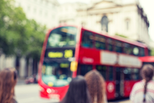 city life, backgrounds and transport concept - city street with red double decker bus in london