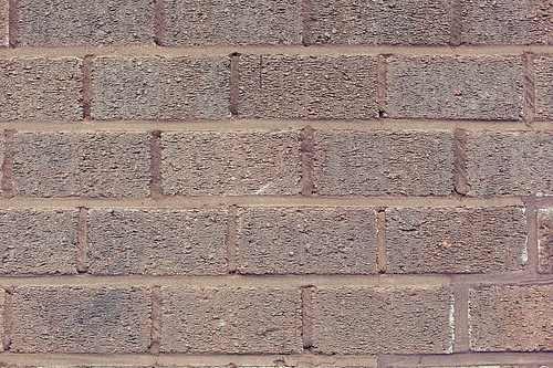 brickwork, background and texture concept - brick wall backdrop