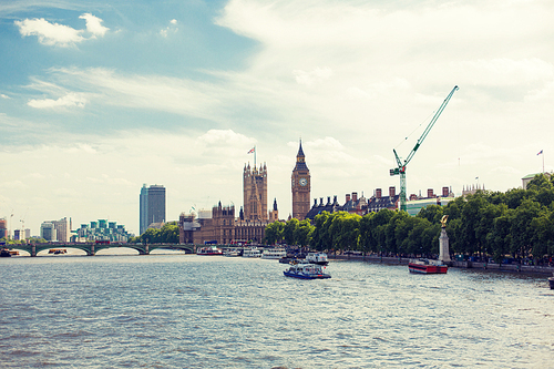 England, London - Big Ben, the Houses of Parliament and Westminster bridge over Thames river