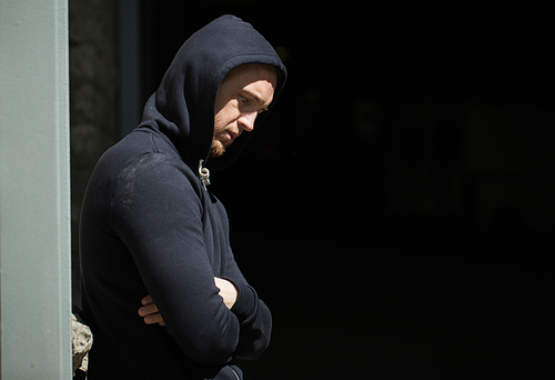 substance abuse, addiction, people and social problem concept - close up of addict man on street