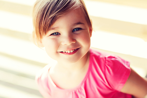 summer, childhood, happiness and people concept - happy beautiful little girl portrait
