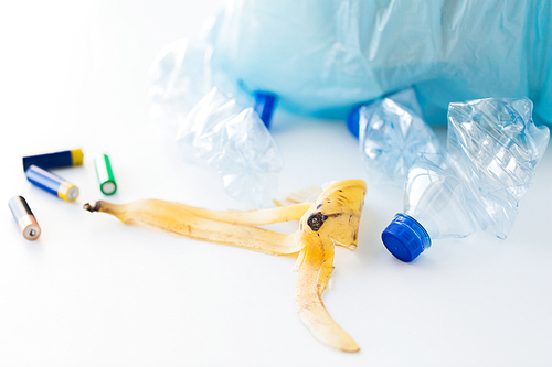 waste recycling, reuse, garbage disposal, environment and ecology concept - close up of rubbish bag with trash or garbage