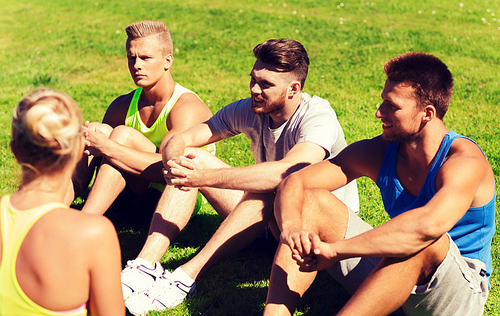 fitness, sport, friendship and healthy lifestyle concept - group of happy teenage friends or sportsmen outdoors