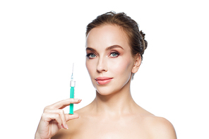 health, people, cosmetology, plastic surgery and beauty concept - beautiful young woman holding syringe with injection over white background