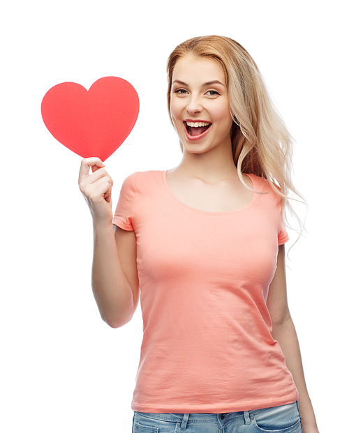 love, romance, charity, valentines day and people concept - smiling young woman or teenage girl with blank red heart shape