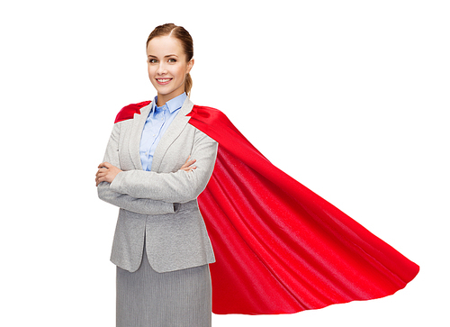 business, power and people concept - young smiling businesswoman in red superhero cape