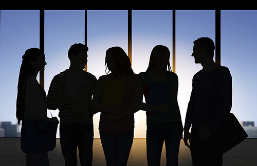 business, education and people concept - people silhouettes over office background