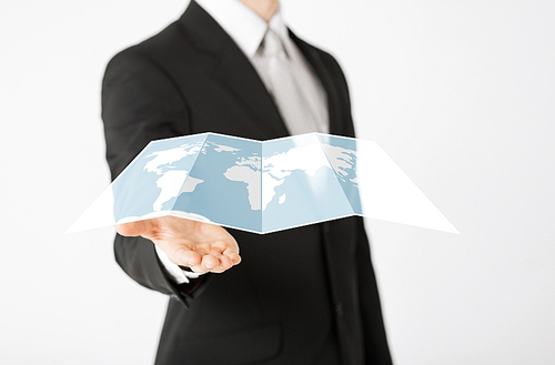 people and business concept - close up of businessman showing world map