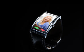 modern technology, communication, object and media concept - close up of black smart watch with incoming call on screen