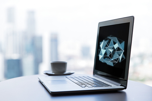 science, cyberspace and 3d technology concept - close up of open laptop computer with low poly structure on screen and coffee cup on table at office or hotel room