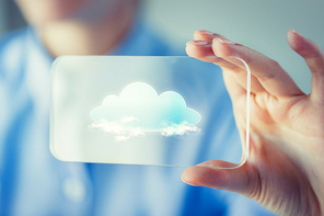 business, technology, computing and people concept - close up of woman hand holding and showing transparent smartphone with cloud icon on screen