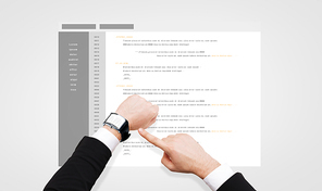 business, people, programming and modern technology concept - close up of businessman hand pointing to smart watch screen with coding
