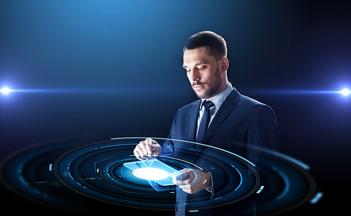 business, people and future technology concept - businessman in suit working with transparent tablet pc computer and virtual projection over black background