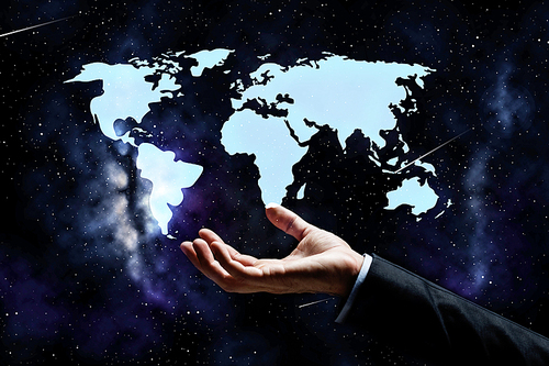 business, people and advertisement concept - close up of businessman hand with world map projection over space background