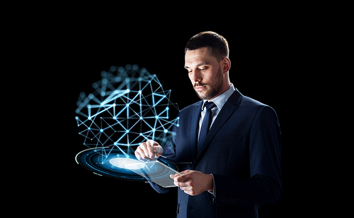 business, people, network and technology concept - businessman working with transparent tablet pc computer and virtual low poly projection over black background