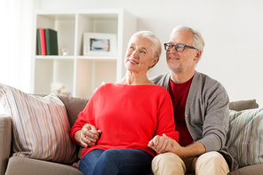 old age and people concept - happy smiling senior couple at home