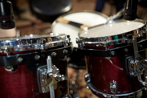 musical instruments and entertainment concept - drums at music studio
