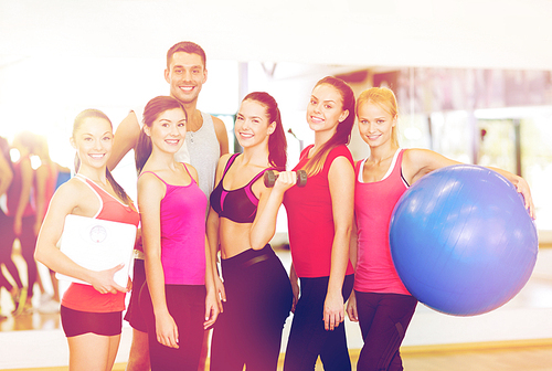 fitness, sport, training, gym and lifestyle concept - group of smiling people in the gym