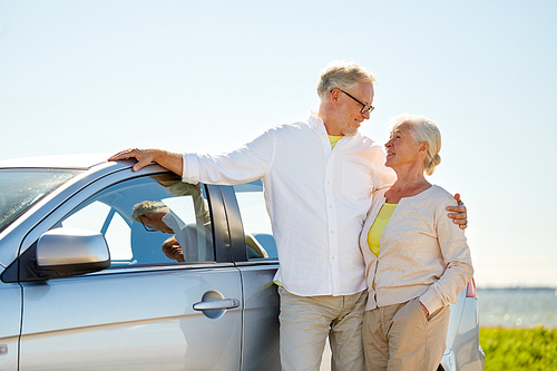 road trip, travel and old people concept - happy senior couple at car in summer