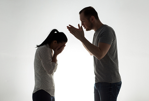 people, relationship difficulties, conflict and family concept - angry couple having argument