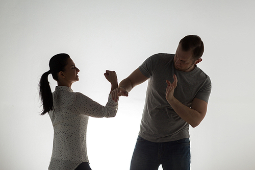 domestic violence, people and abuse concept - angry couple having fight