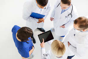 medicine, healthcare and people concept - group of doctors with tablet pc computer at hospital