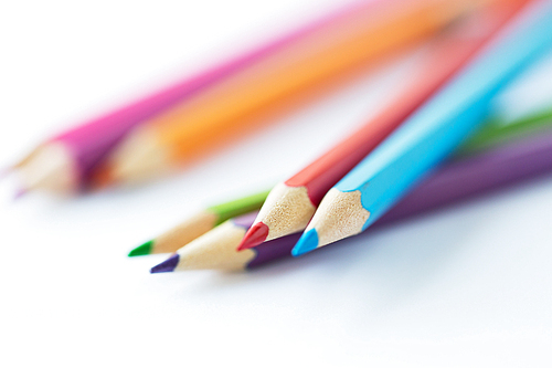 art, color, drawing, creativity and object concept - close up of crayons or color pencils