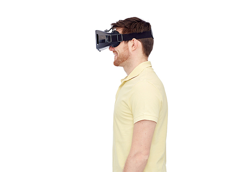 3d technology, virtual reality, entertainment and people concept - happy young man with virtual reality headset or 3d glasses
