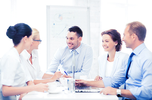 business concept - business team having meeting in office