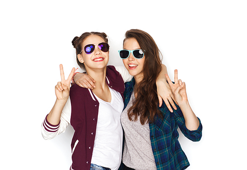 people, friendship, fashion, summer and teens concept - happy smiling pretty teenage girls in sunglasses showing peace hand sign