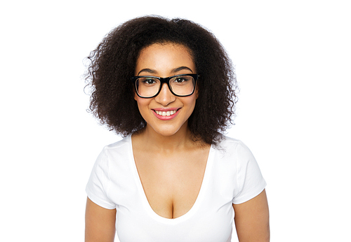 advertisement, education, ethnicity, vision and people concept - happy smiling young african woman or teenage student girl in eyeglasses and white t-shirt