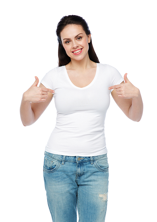 advertisement, clothing and people concept - happy smiling young woman or teenage girl in white t-shirt pointing finger to herself