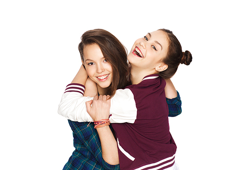 people, friends, teens and friendship concept - happy smiling pretty teenage girls hugging