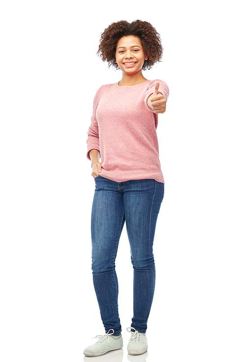 people, race, ethnicity and portrait concept - happy african american young woman showing thumbs up over white