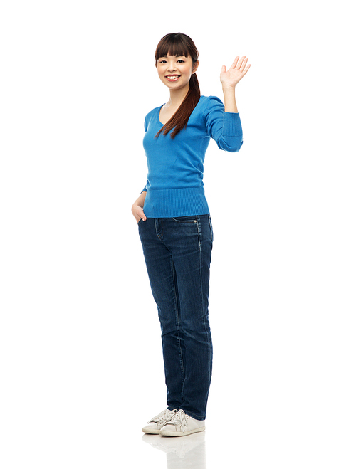 people, race, ethnicity and gesture concept - happy smiling young asian woman waving hand over white