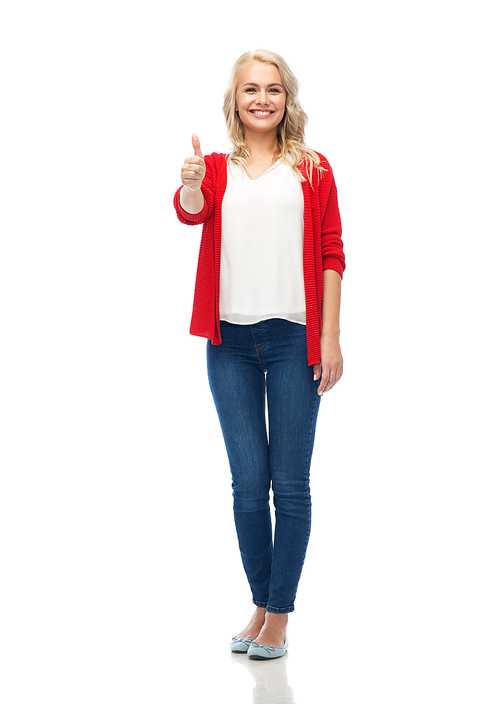 gesture, fashion, portrait and people concept - happy smiling young woman in red cardigan showing thumbs up over white