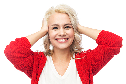 fashion, portrait and people concept - happy smiling young woman in red cardigan