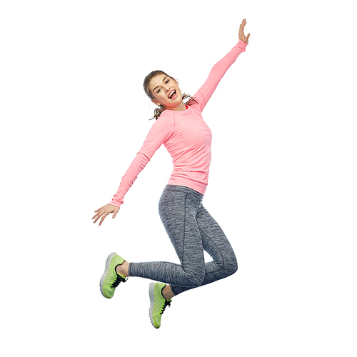 sport, fitness, motion and people concept - happy smiling young woman jumping in air over white background